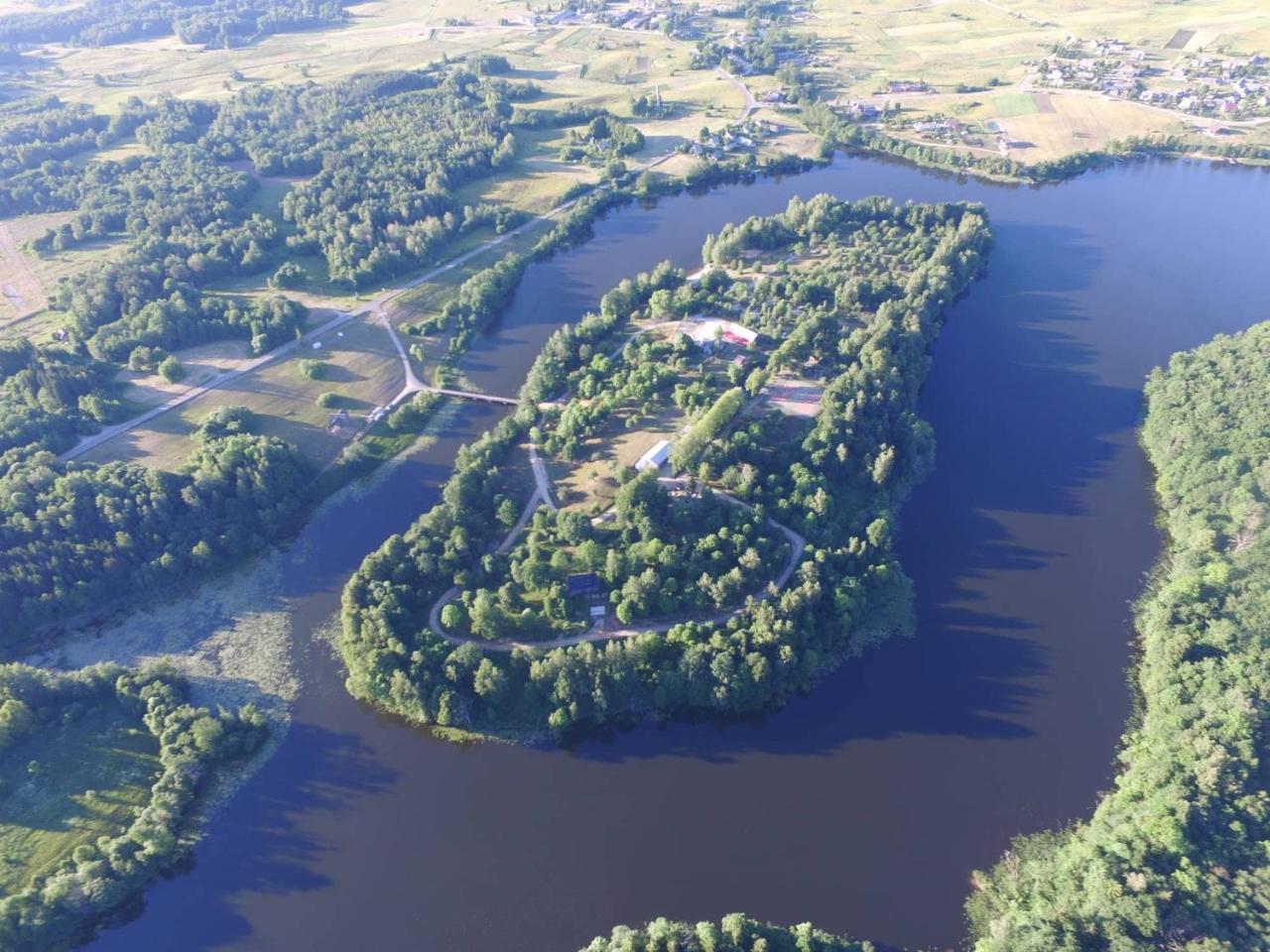 Гостевой дом Poilsio Gyvenviete "Obuoliu Sala" Молетай Экстерьер фото